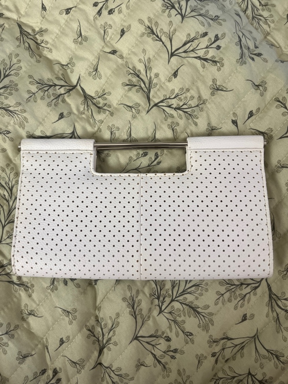 The Limited White Perforated Clutch with Metal Handle